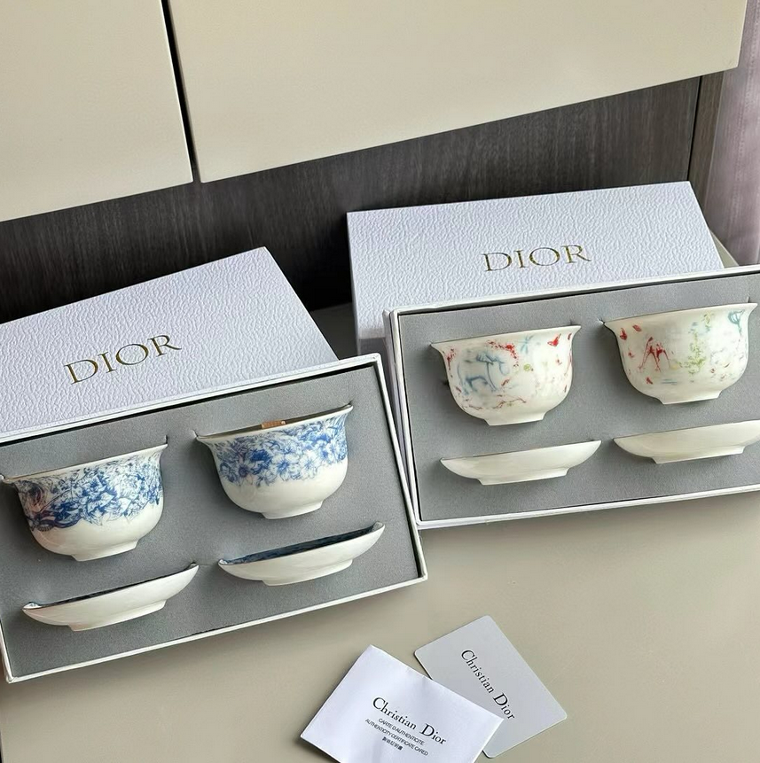 porcelain teacup and saucer sets, often featuring intricate patterns like Toile de Jouy or floral motifs - Dior Candles | Aleppo Gift UAE
