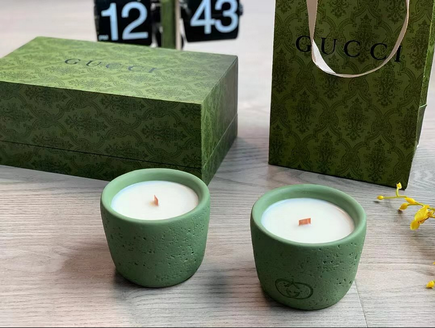 Gucci scented candles in green ceramic containers. - Other Brand Candles | Aleppo Gift UAE